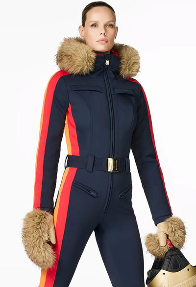 Goldbergh Suvi One Piece Ski Suit in French Blue with Faux Fur Trimmed Hood