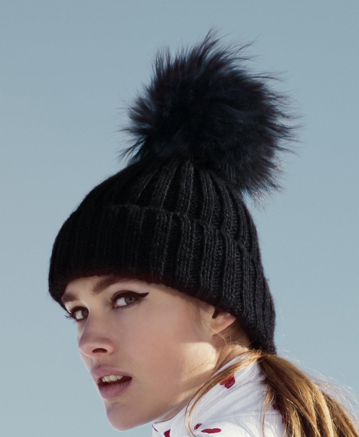Black fluffy pom pom hat sales